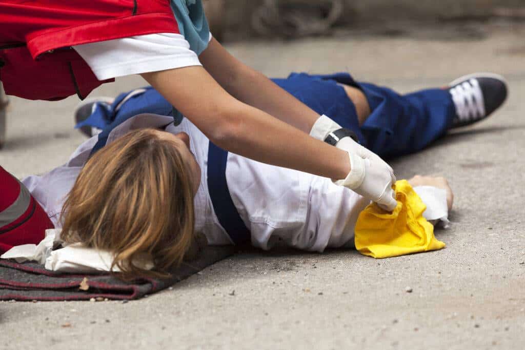 first aid training exercise woman on ground